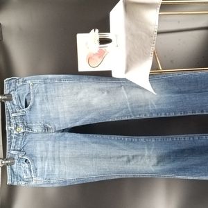 7 FOR ALL MANKIND LOW-RISE FLARE LEG MEDIUM BLUE DENIM JEANS